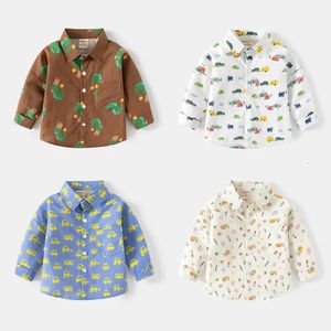 Printemps automne coréen Children Boy Shirt Coton Retter Down Collar Toddler Cartoon Dinosaur Car Imprimé bébé 240122