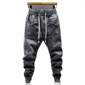 Printemps Automne Hommes Jeans Cordon Élastique Taille Poches Conception Denim Pantalon Couleur Unie Casual Cargo Harem Pantalon T7fv #