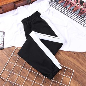 Pantalon de sport printemps automne femme blanc épissage rayé pantalon décontracté taille élastique streetwear cool fille lâche pantalon hip hop Q0801