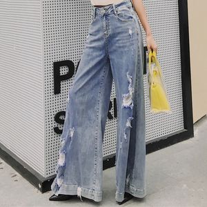 Lente casual korea chique vrouwen flare broek rits effen kleur blauw uitgehold breed been opening denim jeans 8y640 210510