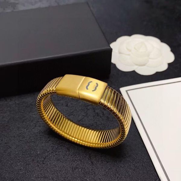 Bracelet à carreaux élastiques à ressort, bracelet en acier avec lettres uniques, bracelet unique avant-gardiste adapté au travail des hommes et des femmes