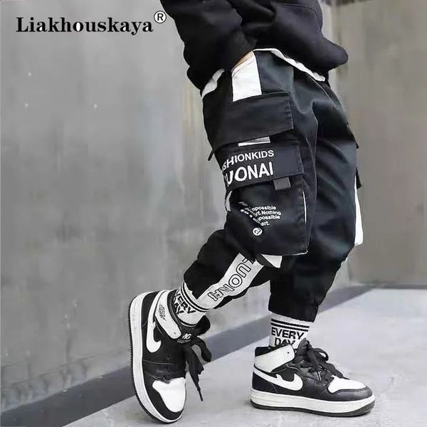 Spring Kids Joggers Cargo Pants de algodón Sport casual Hip Hop Hol Hop Pocket Bolsanes para niños Pantalones de niños 240131