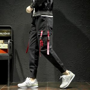 Lente nieuwe casual broek heren designer japanse losse kleine voeten gepersonaliseerd met witte en rode stickers grote maat broek