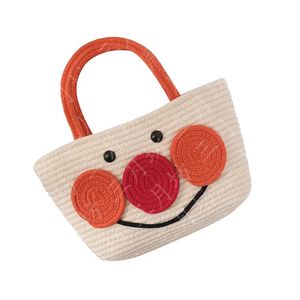 Printemps nouveau pain maman Superman dessin animé main portant coton cordon dessin animé paille tissé sac pour femmes