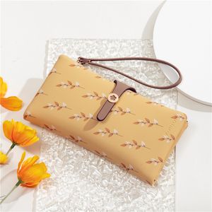 Lente portemonnee Koreaanse versie van de nieuwe portemonnee Wallet Women Long Style Persoonlijkheid mode multi-card positie eenvoudige multifunctionele handtas