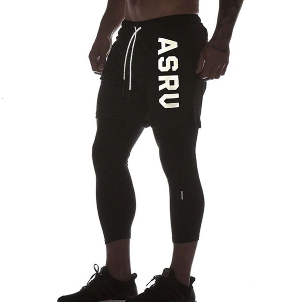 Pantalones deportivos de primavera para hombre, pantalones cortos de camuflaje ajustados de dos piezas para vacaciones juveniles con alta elasticidad y parte inferior para correr de secado rápido