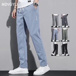 Primavera verano Cotton Mens Pantalones casuales Classic Drawstring Winist delgada estiramiento delgado azul Jogging Trabajo de carga Pantalones de carga Masculino 240415