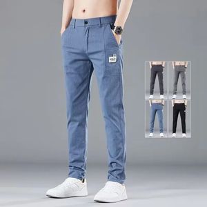 Primavera de verano Diseño de cintura elástica Hombres delgados pantalones casuales de moda de algodón coreano pantalones de negocios de negocios macho azul 240415