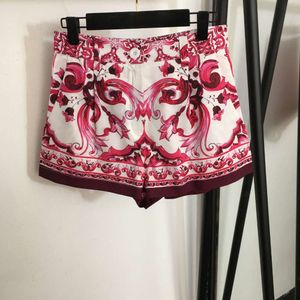 Fashion printemps / été simplicité motif pour femmes imprimé un bouton zipper shorts lâches