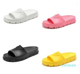 Primavera de espuma de verano espuma breve mulas de goma sandalias de diseño toboganes para hombres zapatillas de mujer zapatillas de pijama de pijama