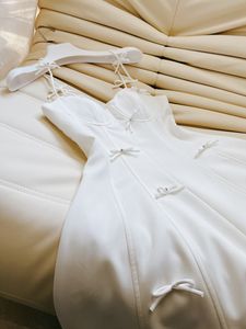 Primavera verano blanco color sólido color cinta de arco de espagua de espagueti correa cuadrada diámetro renovado vestidos casuales cortos j4m258412