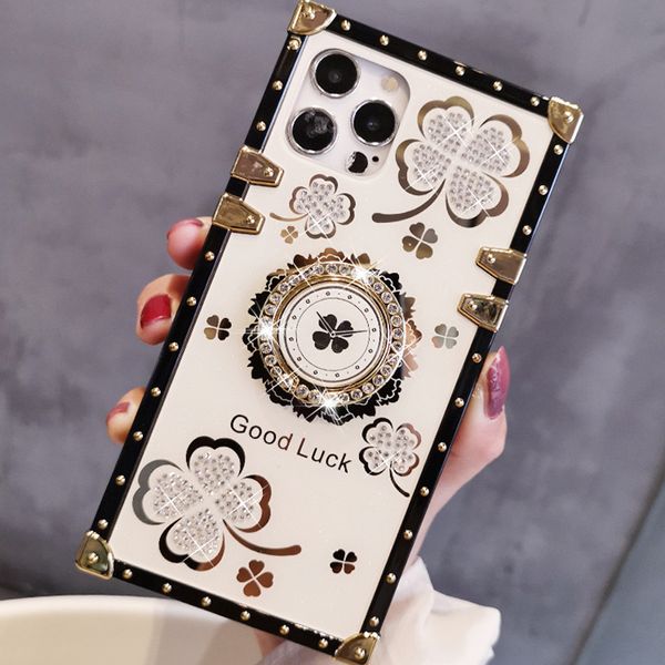 Caja cuadrada Claro Cuatro hojas Flor Diamante Estuches Bling Suave TPU Tronco Decoración de metal Esquina con soporte Soporte de anillo para iPhone 14 13 12 11 Pro XR XS Max X 8 7 Plus