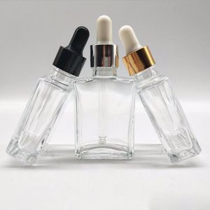 Botellas cuadradas de vidrio para líquidos electrónicos de 30 ml con un recipiente con cuentagotas de vidrio transparente para aceite esencial y aromaterapia 1OZ 400 piezas / lote