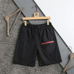 SS Diseñador de moda Traje de baño para hombres Tablero Pantalón de playa Verano Alta calidad Aldult Hombres Mujeres Pantalones cortos Pantalones Use Impresión Playas de lujo Pantalones cortos de natación