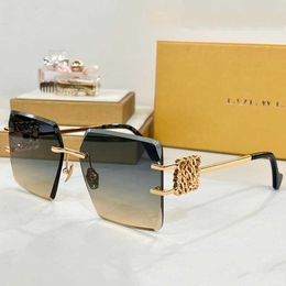 SS24 Femmes Lunettes de soleil carré sans cadre HW2057 Nouveau designer Metal Top Quality UV400 LENS LAGS GOLD LUXURES GOLD LUNEUX 0O98