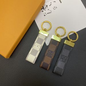 SSYY Porte-clés faits à la main Longes de créateur Boucle en métal pour hommes Porte-clés en cuir Porte-clés de voiture Charme de sac Porte-clés unisexe Accessoires de mode classiques