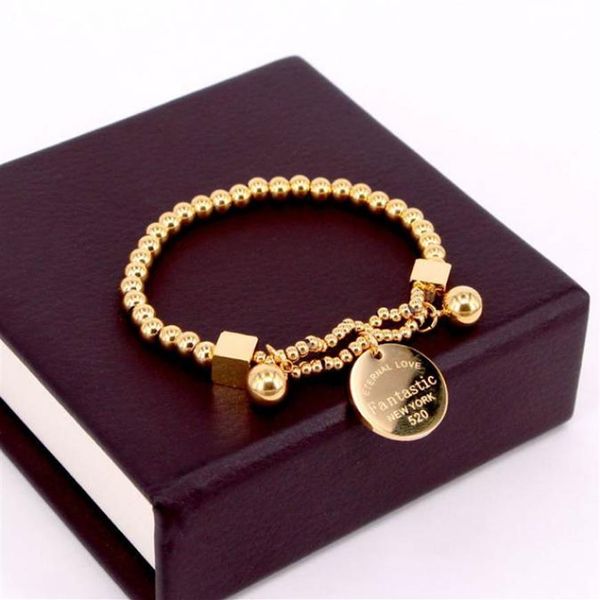 Bracelet de perles en acier inoxydable pour femmes, étiquette circulaire, breloque, brin extensible, 256Q