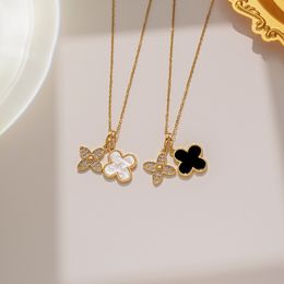 Collier de trèfle en acier inoxydable pour femmes blanc noir de luxe de luxe bijoux élégant charme 4 feuilles love baleine Sailormoon Pendant colliers