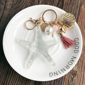 LLavero de estrella de mar, llavero de pareja, artesanía de concha, llaveros de perlas, colgante de bolso para mujer, collar, bombilla, cinta, joyería de moda para coche