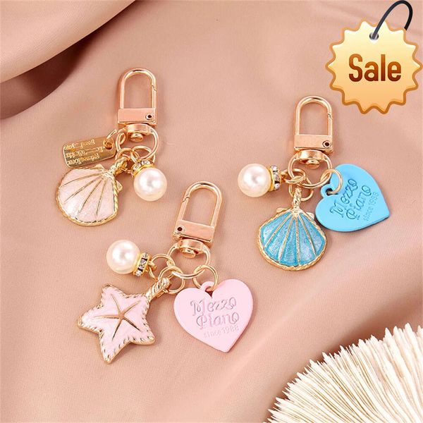 Porte-clés étoile de mer petit amour, doux Romance, sac de voiture, pendentif, étui pour écouteurs, bouteille de parfum, accessoires, bijoux à la mode, cadeau