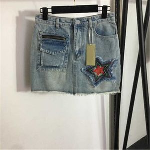 Jupe Stell pour femmes Nouvelle jupe en jean étoile à cinq branches brodée avec doublure de pantalon de sécurité Taille S-XL Jupes de créateurs Vêtements pour femmes Robe courte d'été