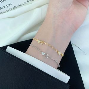 Bracelet clouté en argent sterling avec un petit charme haut de gamme, simple et polyvalent en forme de cœur pêche pour femme