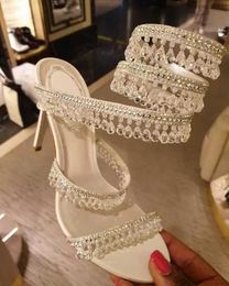 Sandalias de tacón de aguja Rene Caovilla Diseñador de lujo Lámpara de cristal colgante Rhinestone anillo de pie entrelazado zapatos de mujer de alta edición banda estrecha 10 CM Sandalia 3H3G