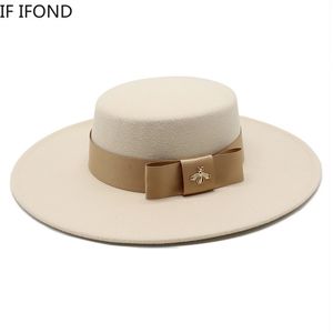 Sombreros de ala tacaña Otoño Invierno Señoras francesas Bownot blanco Top plano Fedora 10 cm Banquete Elegante Vestido de novia de fieltro Cap 230325