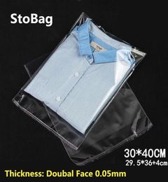 StoBag 100 pièces 3040 cm Transparent auto-adhésif en plastique OPP refermable Poly Cellophane vêtements sacs clair emballage sac cadeau Y12024753514
