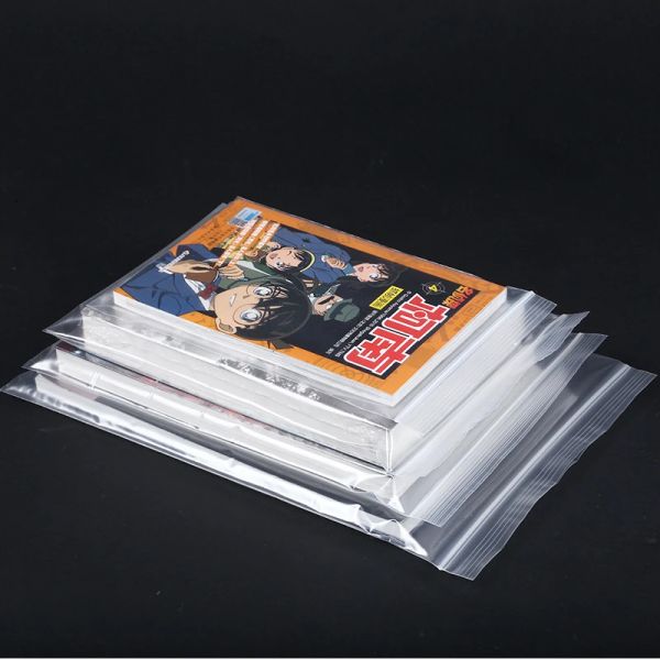 Stobag 100pcs Transparent Ziplock Poly Sac Books Couvrir la poche en plastique auto-séche