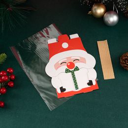 Stobag 40pcs Año Nuevo Marry Bolsas de Navidad Packaging Goolages Candy Cookies Santa Claus suministros para niños hechos a mano Favores de fiesta feliz