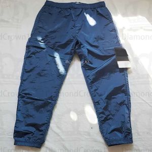 Stones Island Diseñadores de pantalones Pantalones cargo Metal CP Companys Pantalón Bolsillo de nailon Insignia bordada Pantalones casuales Pantalones reflectantes finos 995