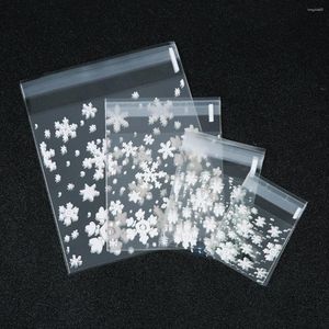 Opbergtassen 100 stcs/lot transparante sneeuwvlok op zelfafdichtingzak voor koekjes snoeppakket sieraden cadeauverpakking accessoires groothandel