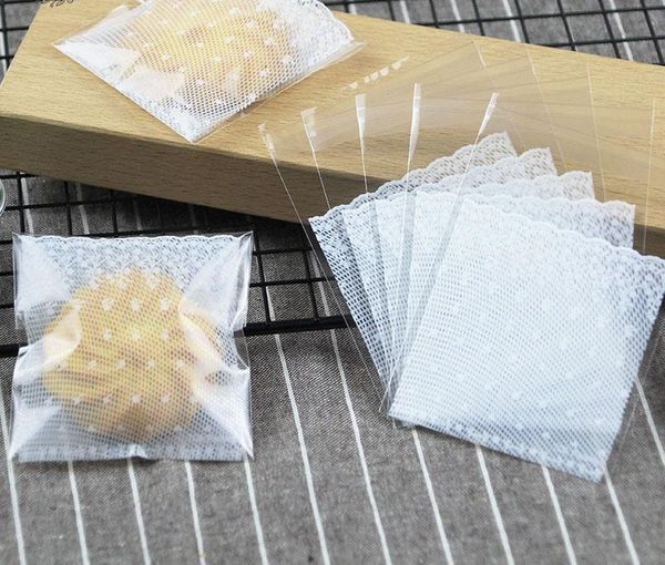 Sacs de rangement 100pcs plastique transparent dentelle maille bonbons biscuit collation cuisson sac cadeau bricolage pochette auto-adhésive mariage fête d'anniversaire fournitures