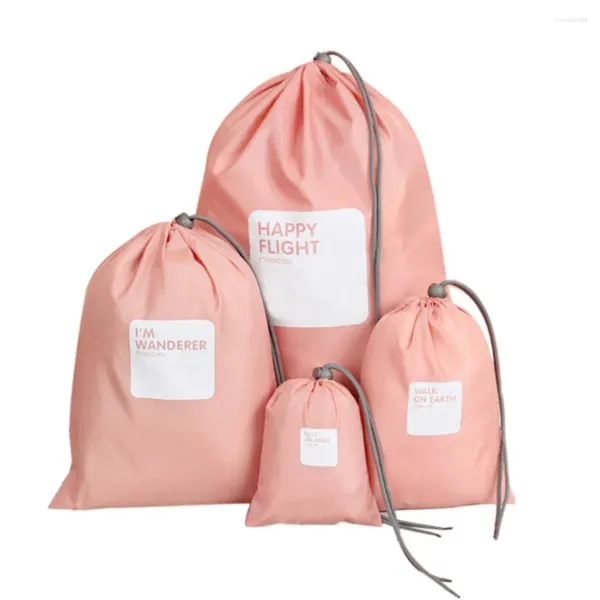 Sacs de rangement 4pcs Sac de voyage Sac de voyage imperméable en nylon sage à cordon hommes et femmes vêtements pliants organisateurs classifiés.