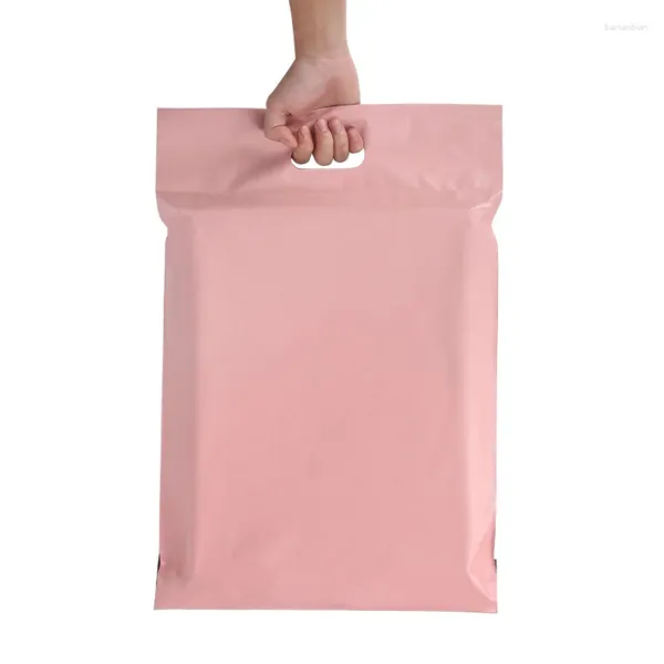 Sacs de rangement 50pcs / lots enveloppe de couleur rose envoyez un envoi de vêtements épaissis écologiques