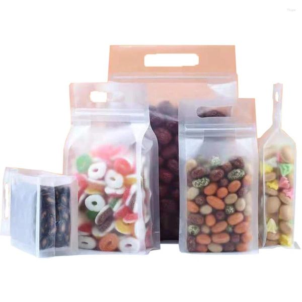 Bolsas de almacenamiento 50 unids Matte Clear Plastic Stand Up Bag con asa Resellable Resellable Tear Notch Doypack Food Candy Chocolate Pack