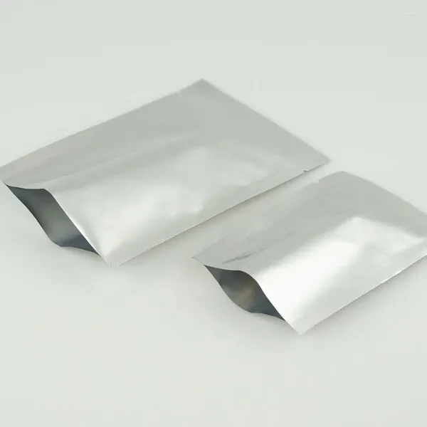 Bolsas de almacenamiento 7x10 cm 200 piezas Aluminio puro - Sellado térmico blanco plateado Bolsa de alimentos de plástico puramente de aluminio Paquete de champú / polvo sellable al vacío