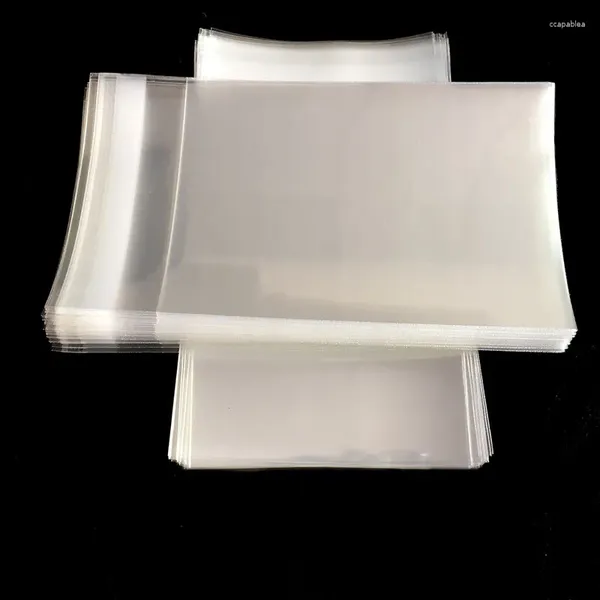 Sacs de rangement sac en plastique transparent 100pcs / lot (A4 213x303 mm) Tissu auto-scellé cellophane OPP 8..5x12 pouces