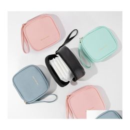 Bolsas de almacenamiento Cool Pu Bolsa de cuero Maquillaje portátil Lápiz labial Auricular S Viaje a prueba de agua Servilleta sanitaria Pad Organizador Venta al por mayor Drop Ot4Sb