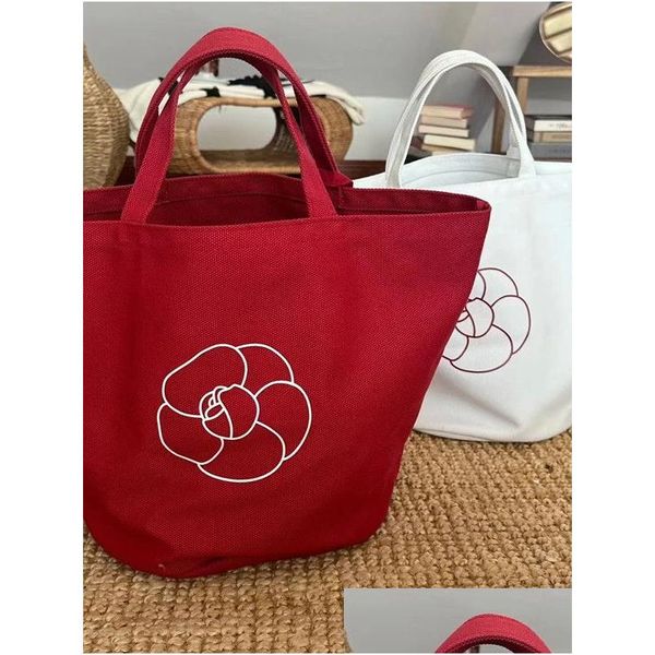 Bolsas de almacenamiento Diseñador Color Sólido Tienda Bolsa Flor Clásico Letra Logotipo Impresión Retro Red Canvas Mano One Shoder Ambientalmente Fri Dhwv0