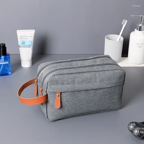 Sacs de rangement Sac de toilette pour hommes Voyage Portable Produit de soins de la peau Main Différence Double couche Cosmétique résistant à l'humidité