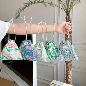 Sacs de rangement petit sac à main en tissu imprimé floral voyage de voyage cosmétique à lèvres à lèvres sac à main sac à main femmes portefeuille portable sachet organisateur de portefeuille