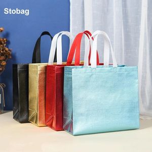 Sacs de rangement StoBag 25pcs en gros non-tissé fourre-tout sac à provisions tissu portable étanche pochette réutilisable logo personnalisé (frais supplémentaires)