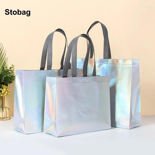 Sacs de rangement Stobag 50pcs en gros laser Laser non tissé Tot Tot Fabric Shopping Achage réutilisable Logo personnalisé (frais supplémentaires)