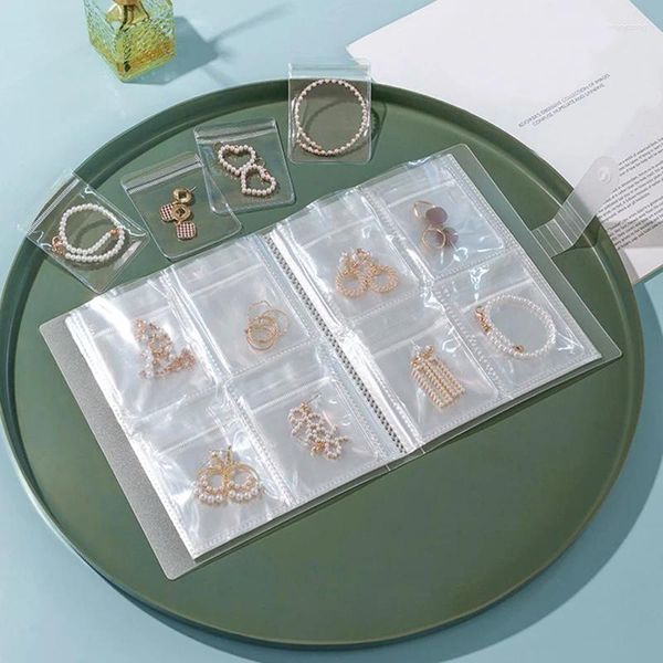 Bolsas de almacenamiento joyas transparentes 160 cuadrículas anillo de aretes de bolsas antioxidación de la cubierta organizador de estampillas