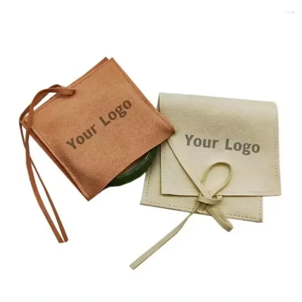 Sacs de rangement en gros 500pcs / lot Logo personnalisé enveloppe enveloppe Bijoux de boucles d'oreille Collier Sachets avec emballage de micro-fibre à cordes