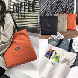 Opbergtassen vrouwen tote tas esthetische vaste kleur studenten casual handtas schouder grote capaciteit oxford herbruikbaar winkel strand