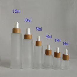 Bouteilles de rangement 1 oz 2 4 pompe en bambou / compte-gouttes vide vide givré verre pour cosmétique bouteille de lotion de luxe avec pompe