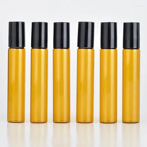 Bouteilles de rangement 10 ml rouleau sur le verre ambre portable parfum rechargeable Échantillon d'huile essentielle vide avec capuchon en plastique en gros de 100pcs / lot